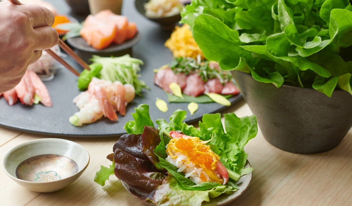 Hand-rolled sushi wrapped in lettuce