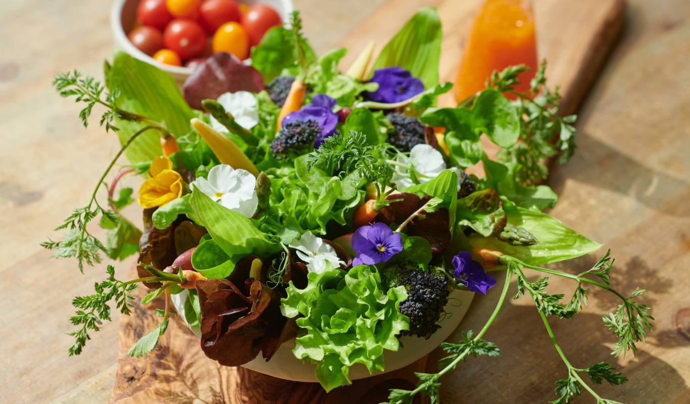 Decorate with edible flowers for a bouquet salad.